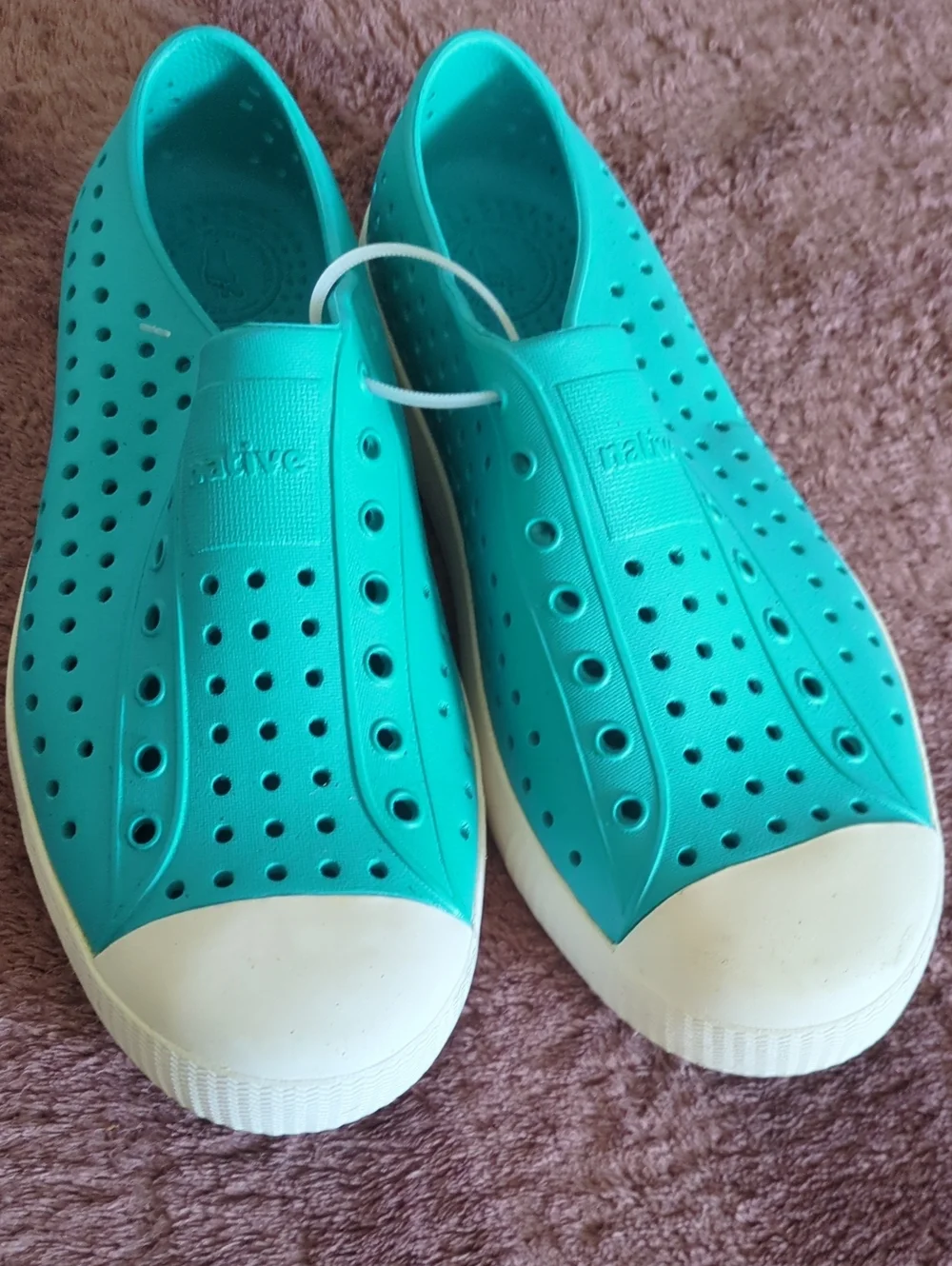 Native Jefferson Slip-On Sneakers in Teal with White Toe
